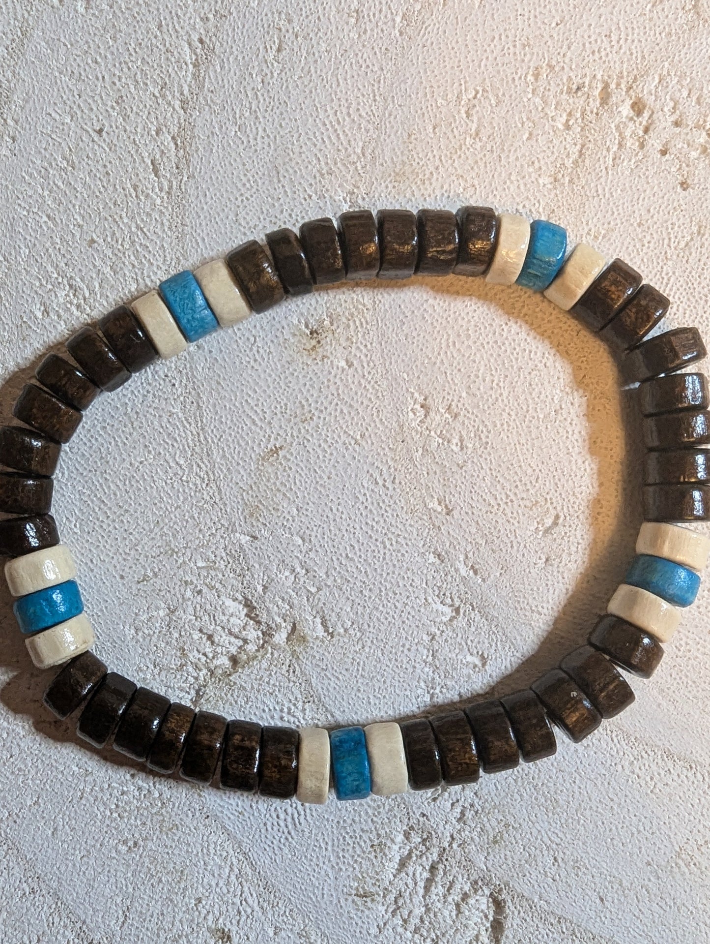 Beaded bracelet with brown, blue, and white beads