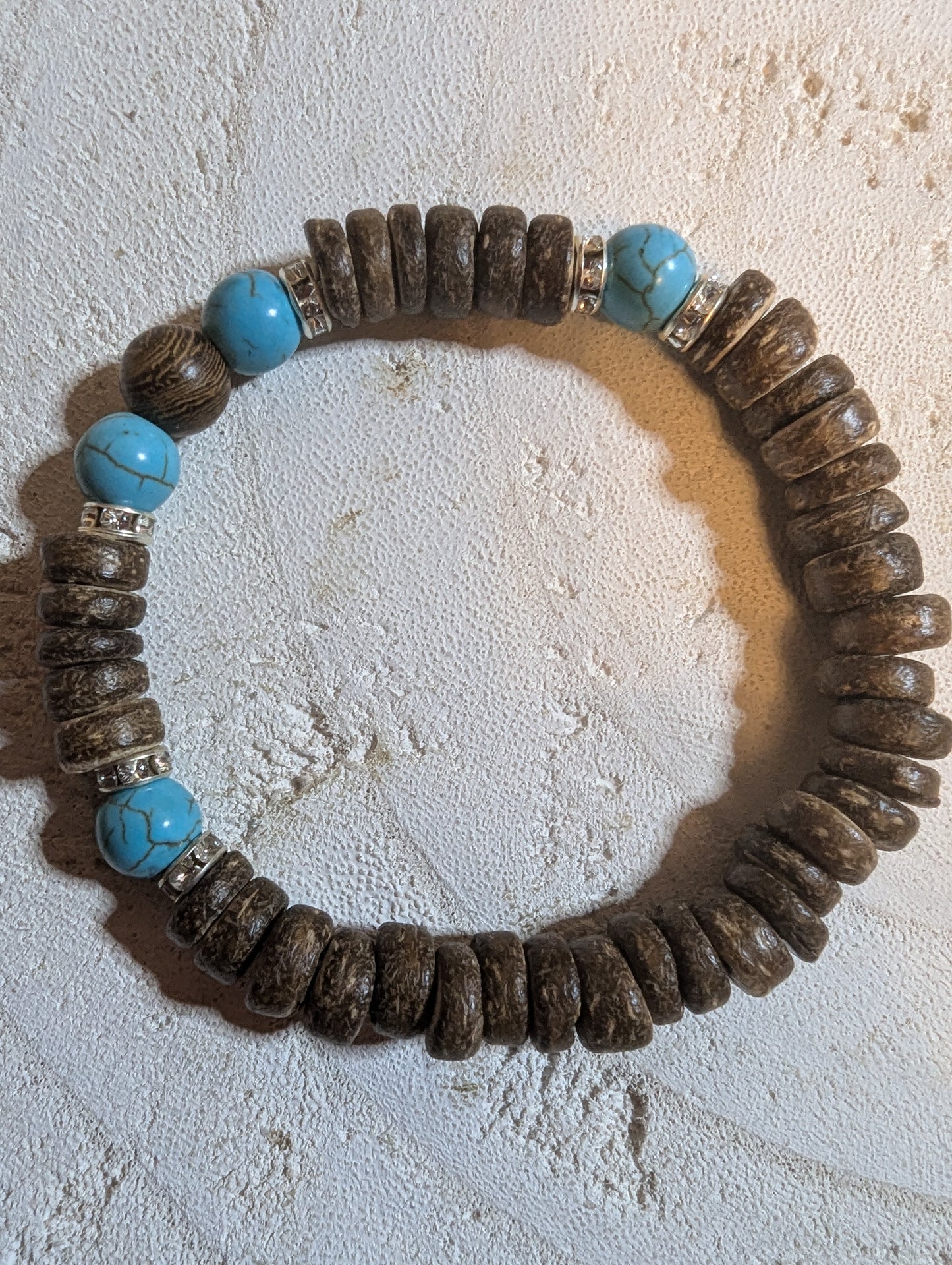 Bracelet with brown beads and blue accents