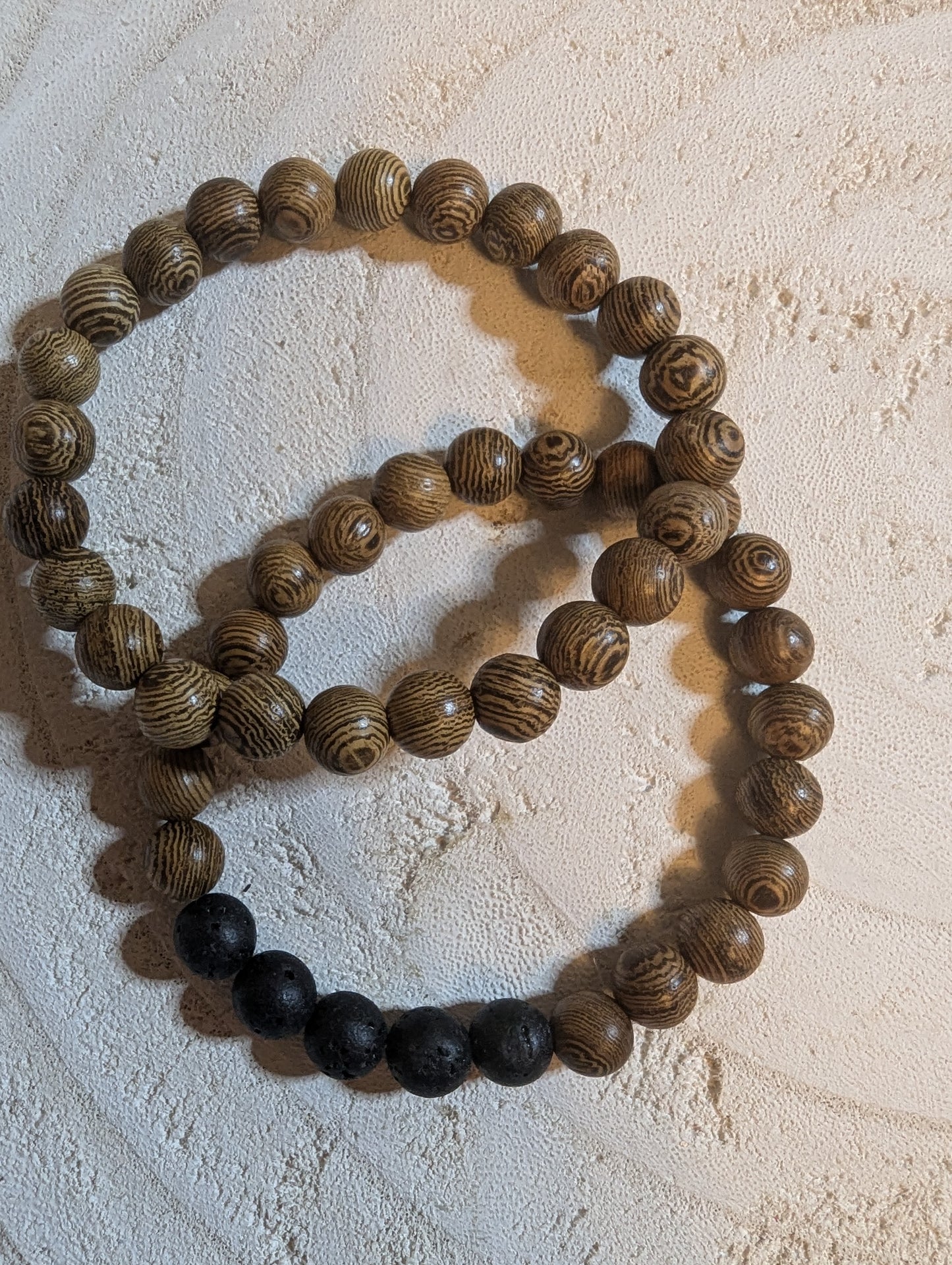 Beaded bracelets with brown and black wooden beads