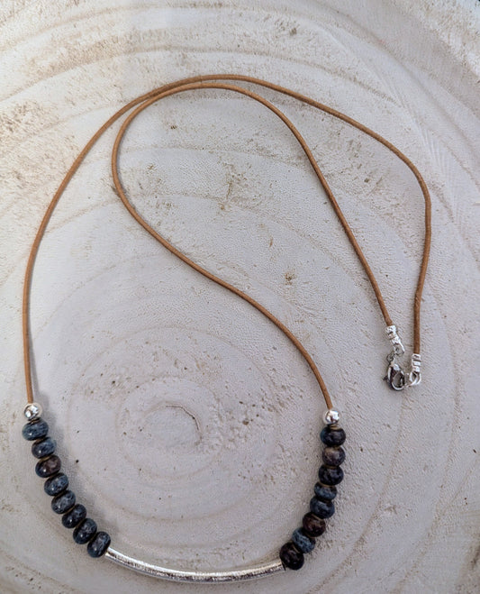 Ceramic beads from Sedona AZ with .925 sterling silver bar on a leather cord. $20