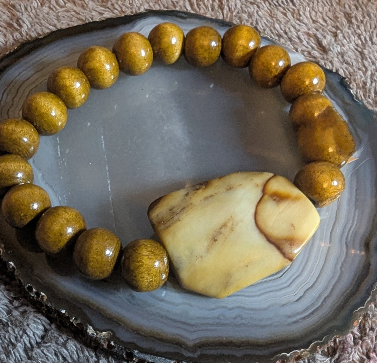 Bracelet with wooden beads  $20