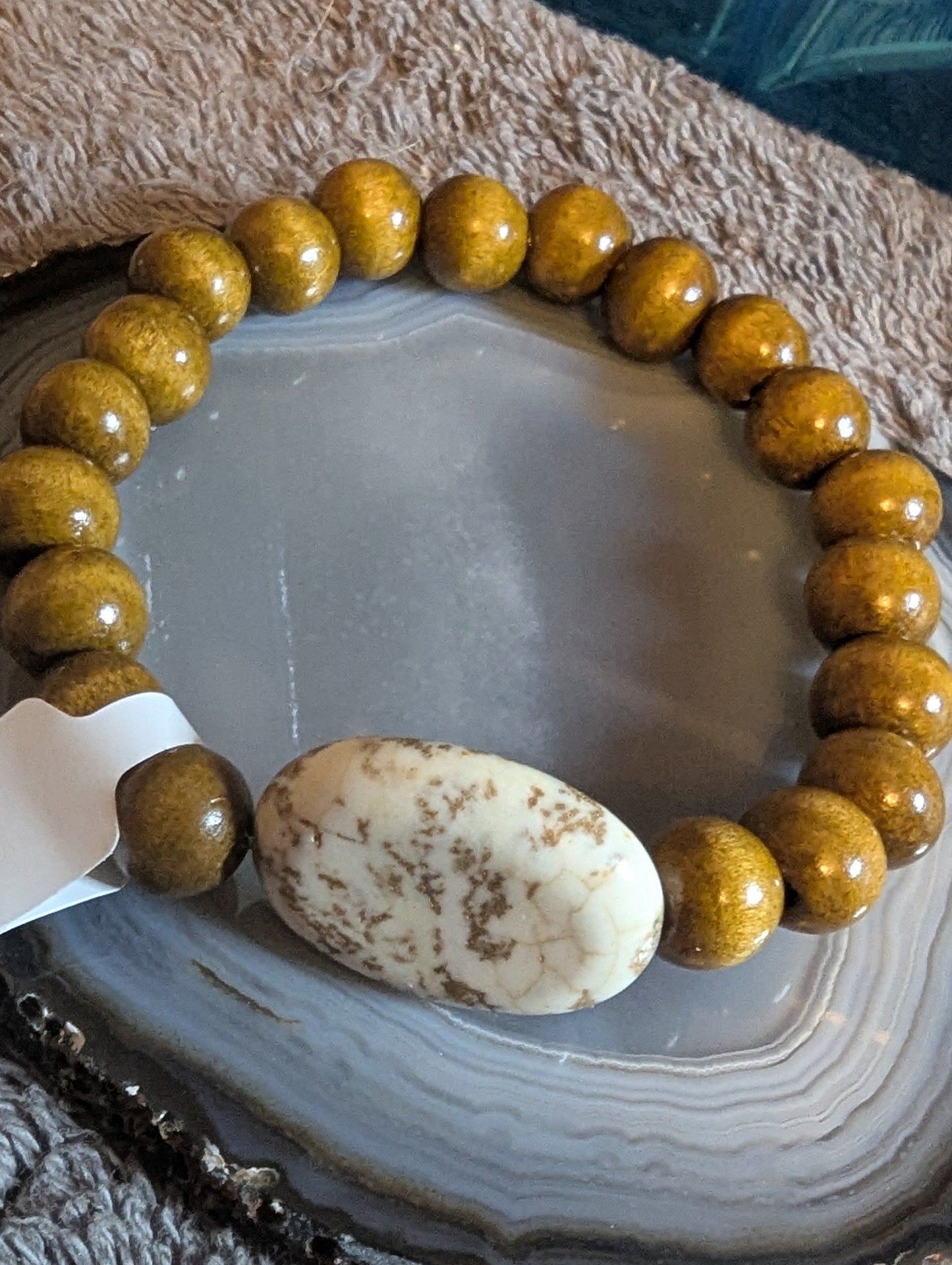 wooden  beaded bracelet with a beautiful  stone pendant