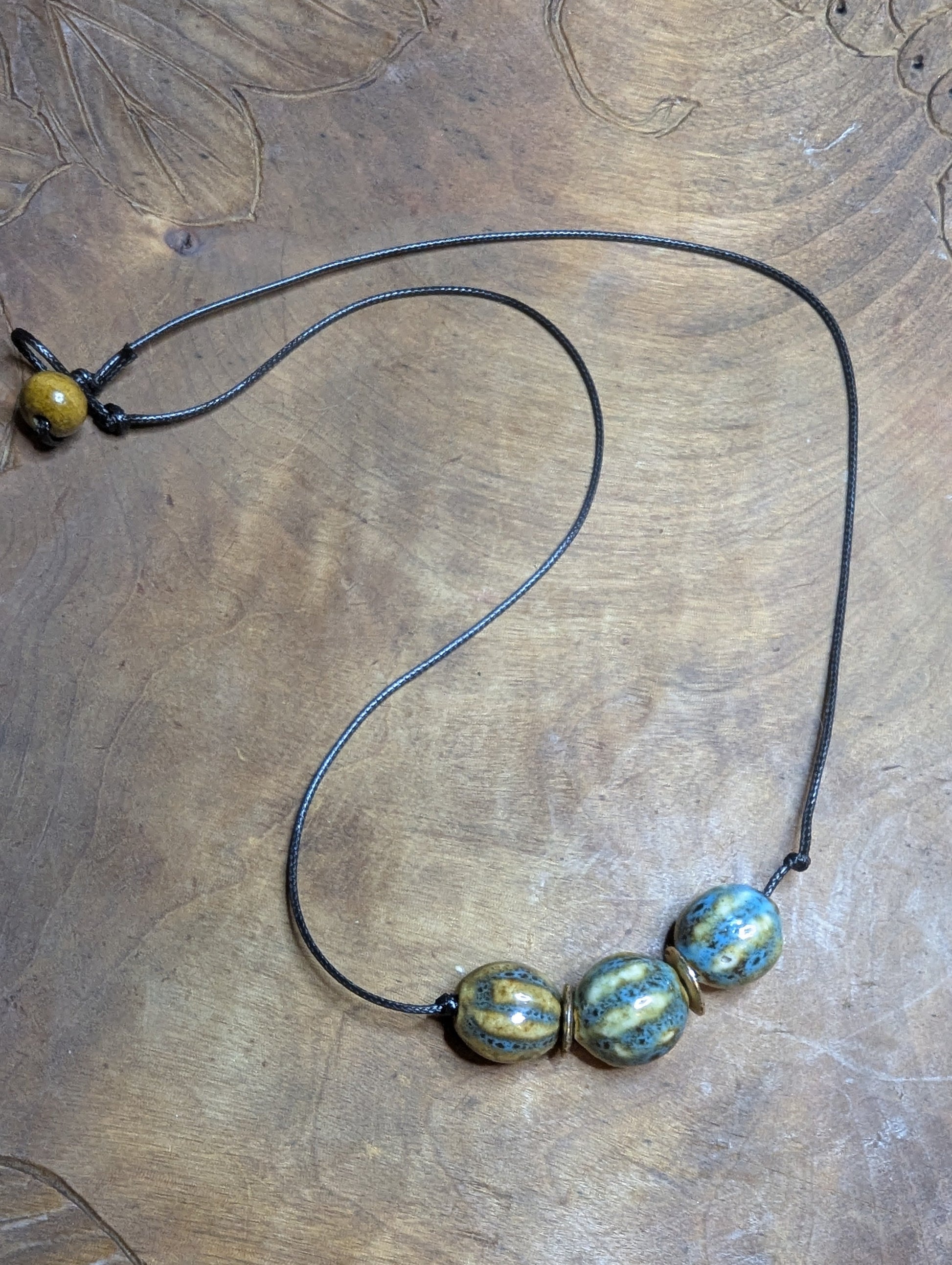 Necklace with three ceramic beads from Sedona, AZ