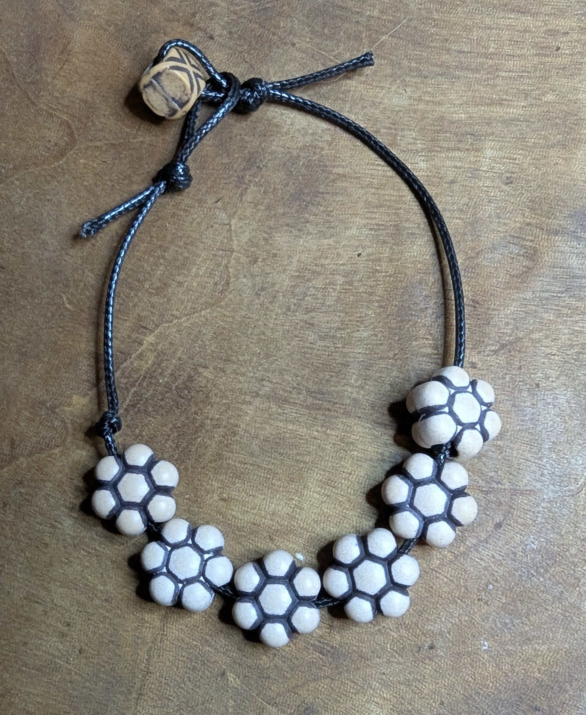 Necklace with white and black wooden beads