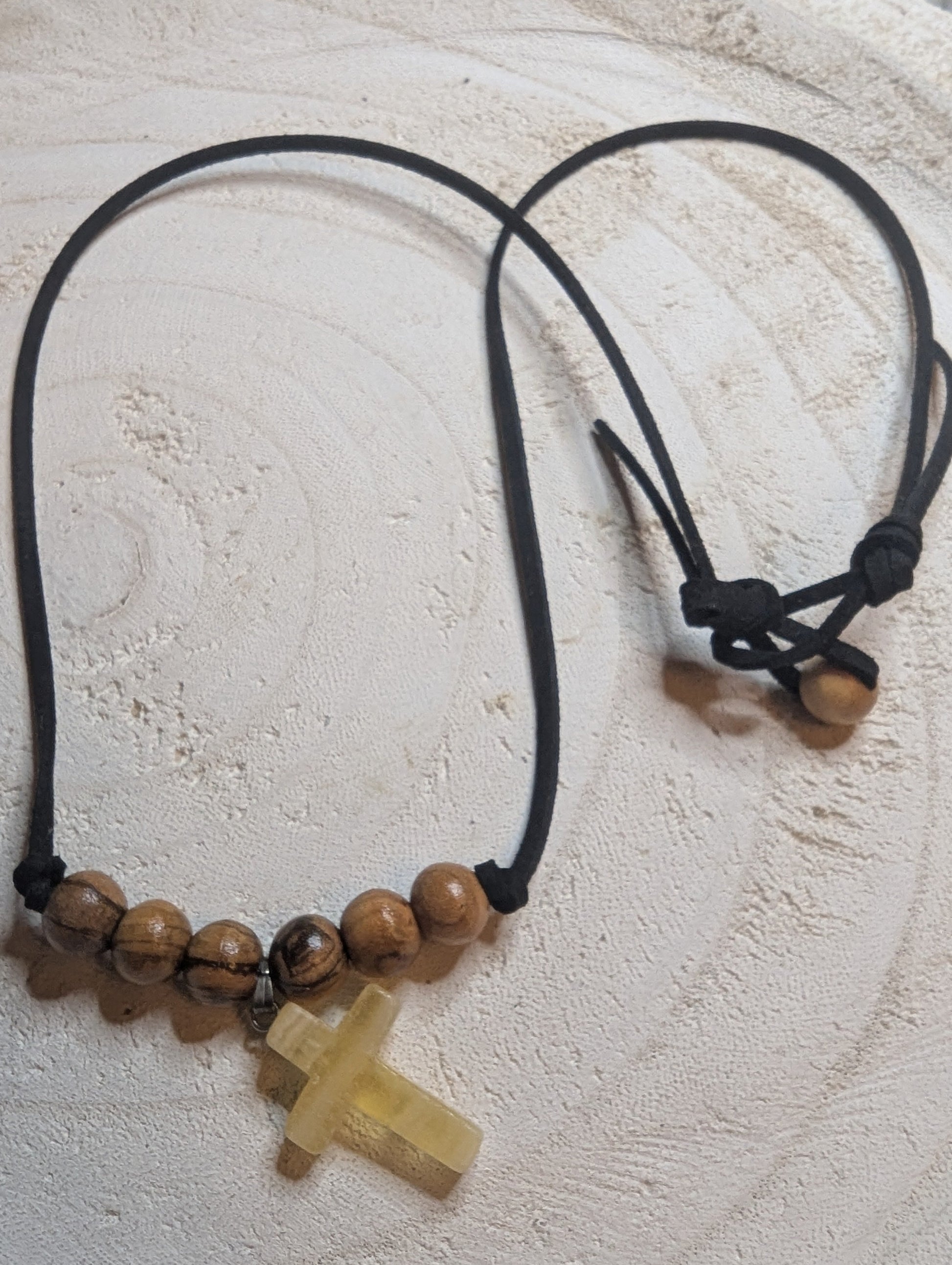 Necklace with wooden beads and a cross pendant 