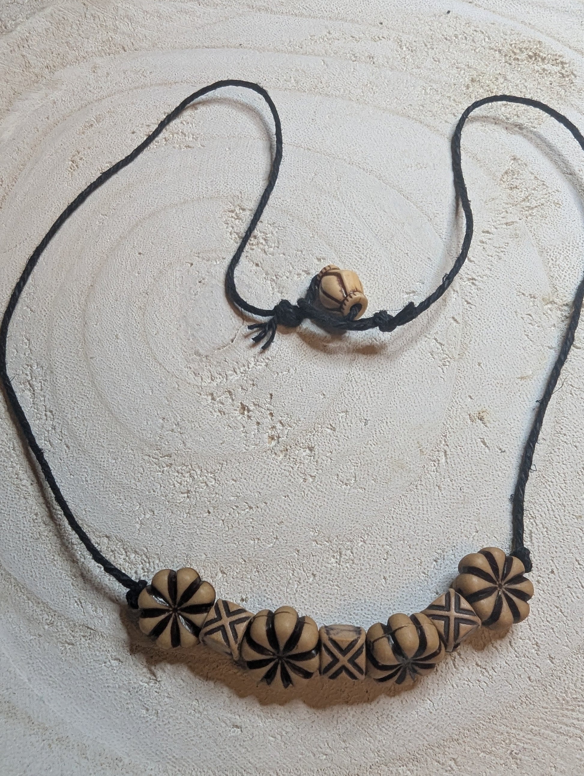Necklace with wooden floral beads