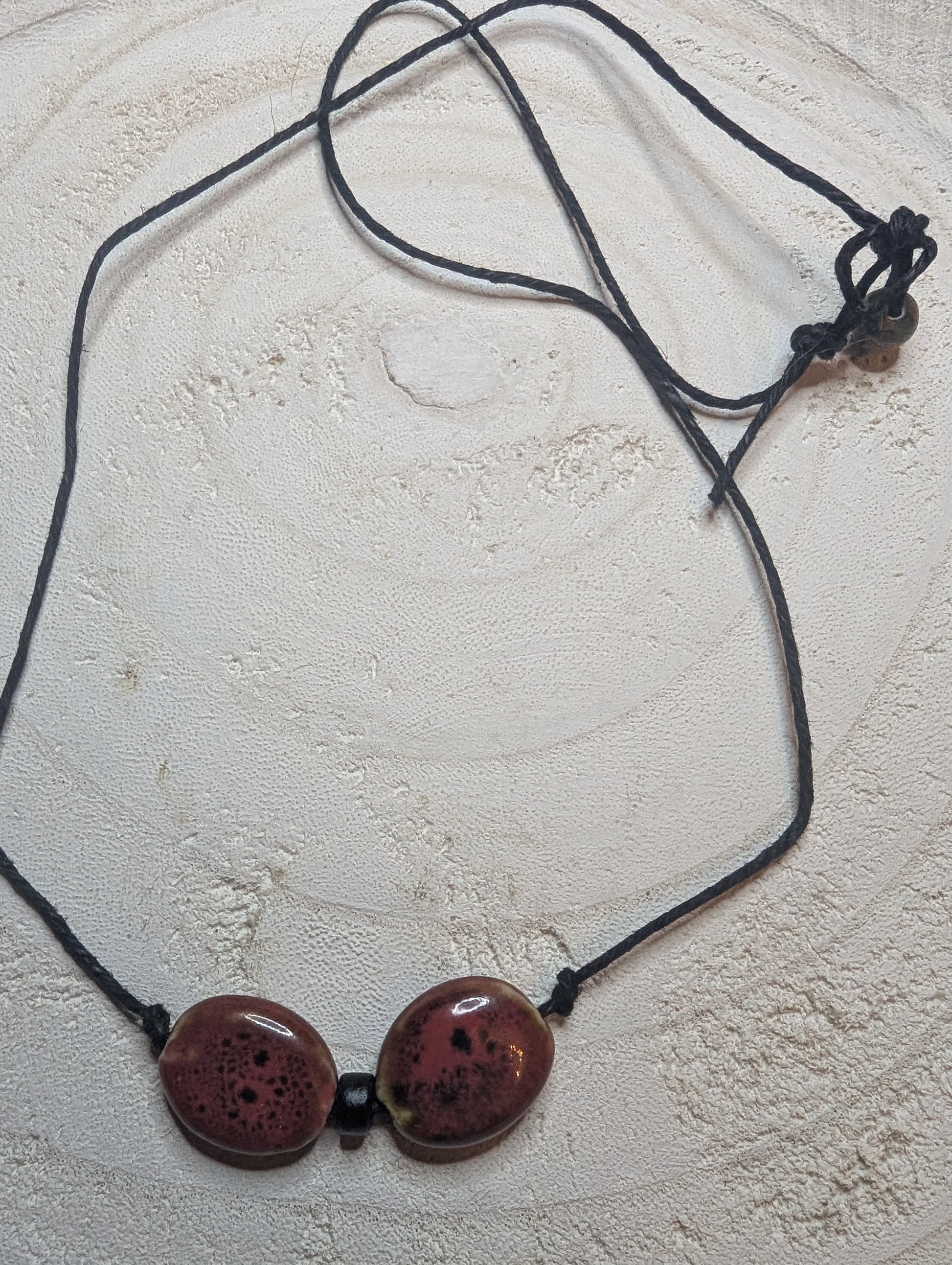 Necklace with two redish brown beads straight from the Sedona mountains $20