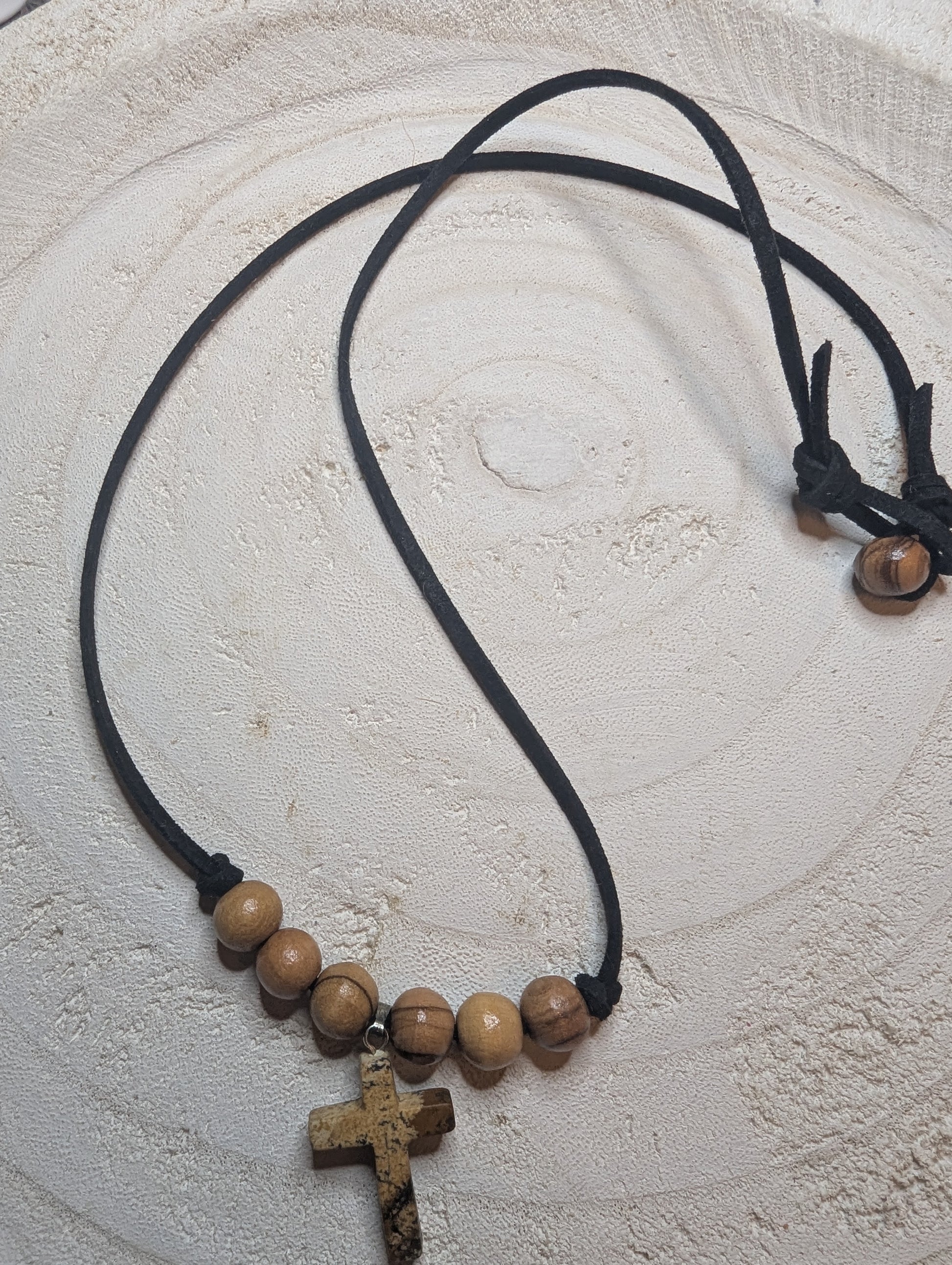 Necklace with wooden beads and a cross pendant
