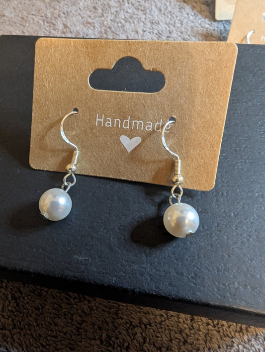 Beautiful opalescent pearl drop earrings with a dreamy, ethereal quality