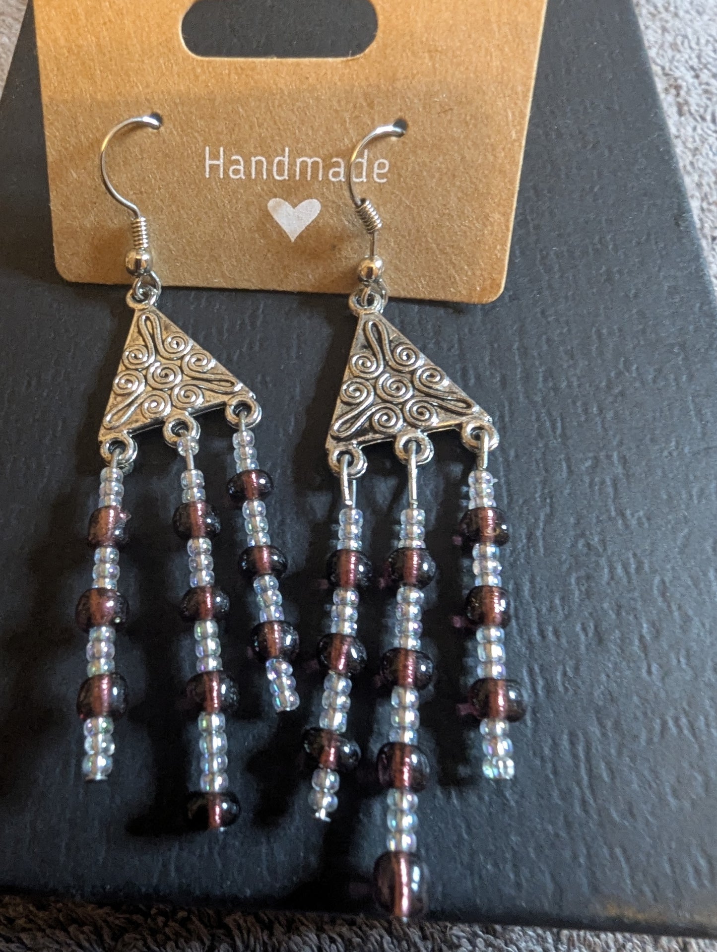 Chandelier earrings in sterling silver with multi-strand dangles