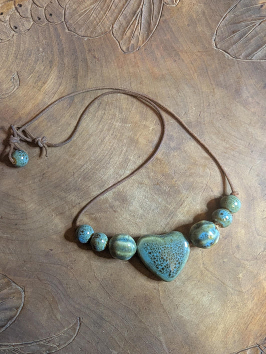 Louii collection Blue ceramic beaded necklace on a leather cord.